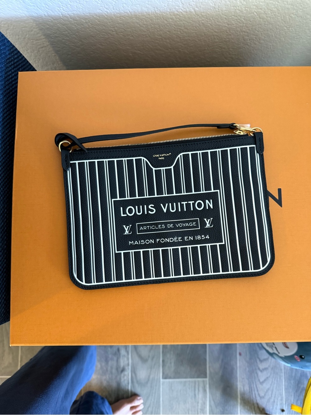 Louis Vuitton Black and White Stripe Wristlet with Gold Hardware - Picture 2 of 7